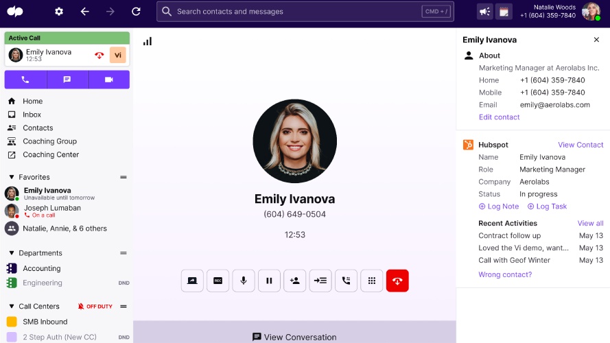 An active call at the center of the Dialpad interface and a HubSpot customer profile on the right side.