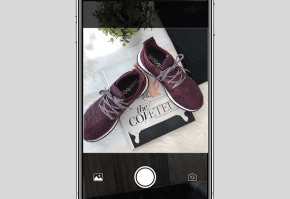 Clicking on "Sell" prompts your camera to open and take a photo of the item to list