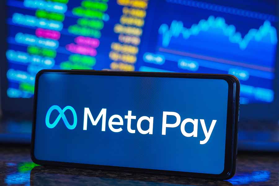 Meta Pay logo is displayed on a smartphone screen.