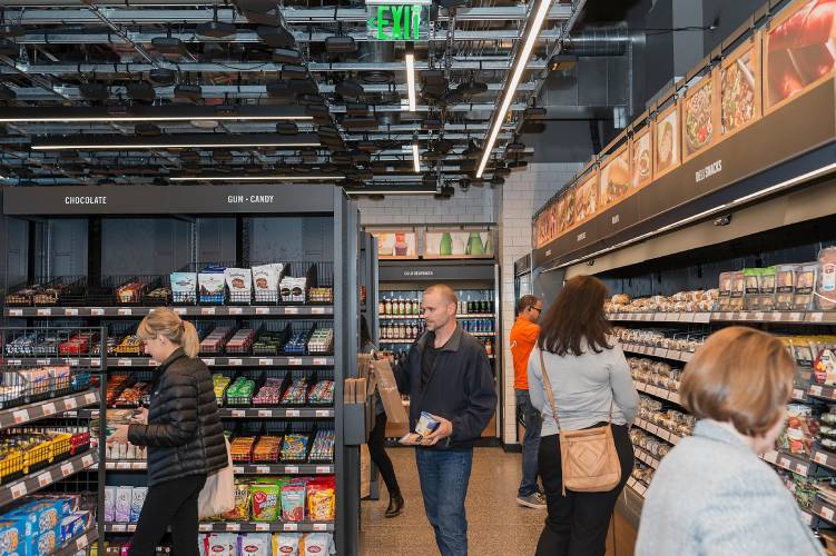 People shopping inside Amazon Go in Seattle