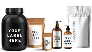 A variety of bottles and pouches with minimalist labels that read "Your label here".
