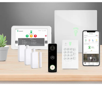 Frontpoint security system with hub and keypad, 3 door/window sensors, a motion sensor, an indoor camera, a heat and smoke alarm, a flood sensor, and the phone app.