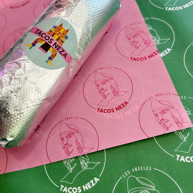 Tacos Neza's branded packaging design.