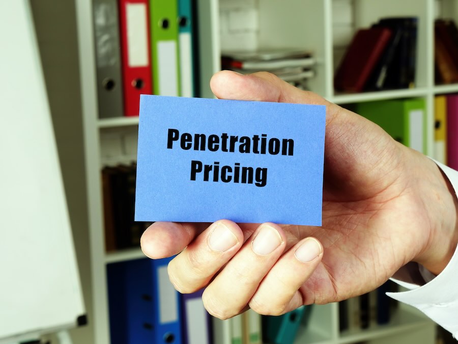 Business concept meaning Penetration Pricing with inscription on the blue business card.