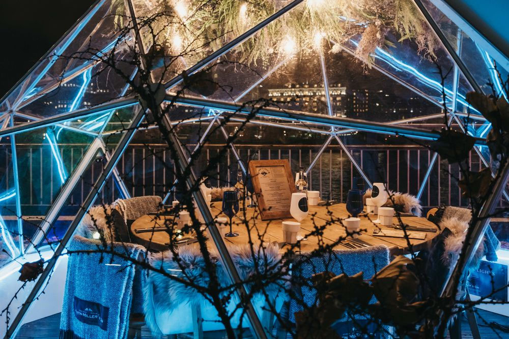 A pop-up restaurant in a geodesic structure.