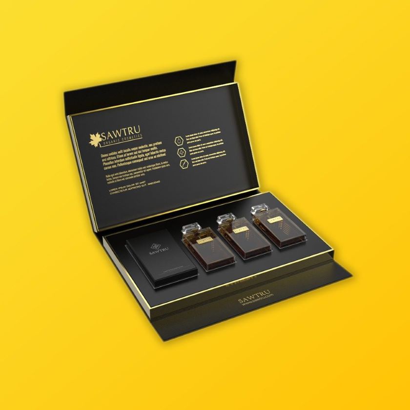 Sawtru perfumes box of three perfumes in black box with gold writing.