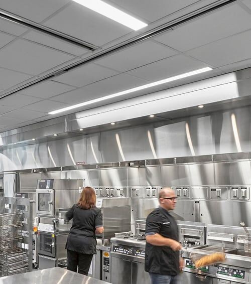 picture of people within an industrial kitchen
