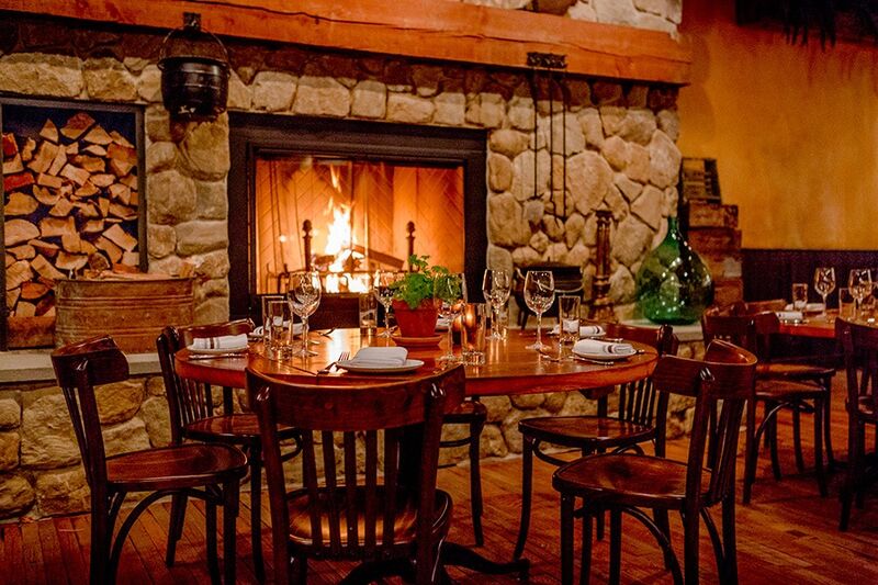 restaurant dining room with a fireplace