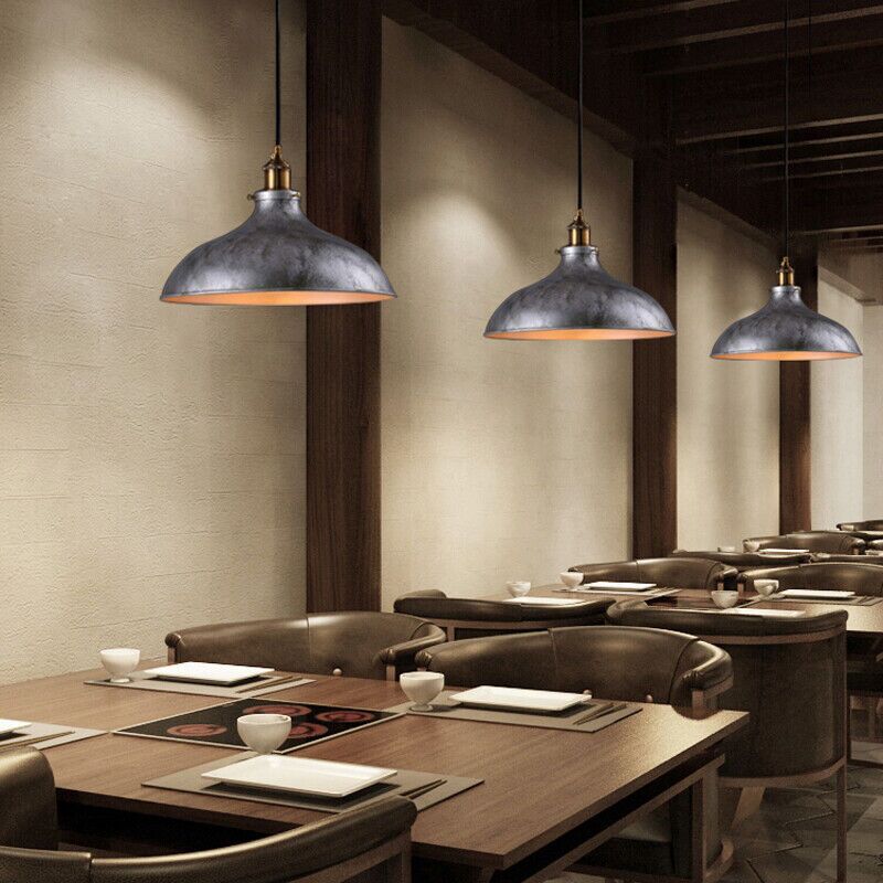 Restaurant dining room with hanging lamps
