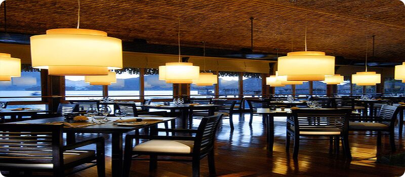 warmly lit restaurant dining room