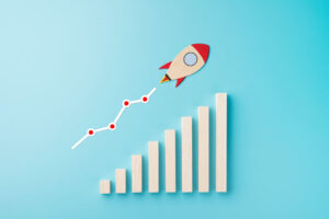 animated image of rocket and chart on blue background