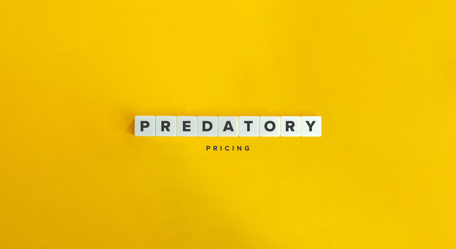 Predatory Pricing Banner. Block Letter Tiles on Yellow Background.