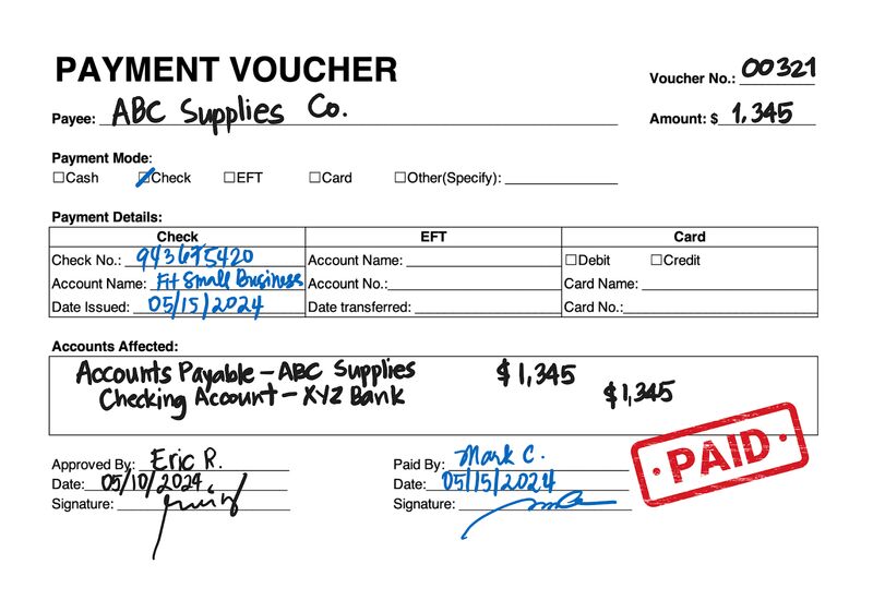 A completed payment voucher form stamped as PAID.
