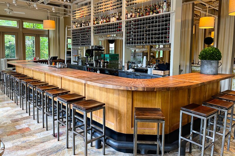 Print Works Bistro interior using salvaged walnut trees.