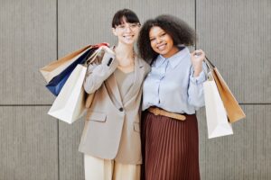 Two Young Women Enjoying Shopping