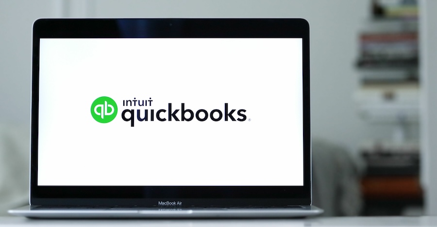 Laptop displays the logo of Quickbooks an accounting software program.