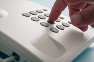Dialing telephone number.