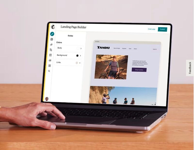Mailchimp's landing page builder on a laptop screen, showing how a landing page can be built, picturing a fictional bike company called Tandu.
