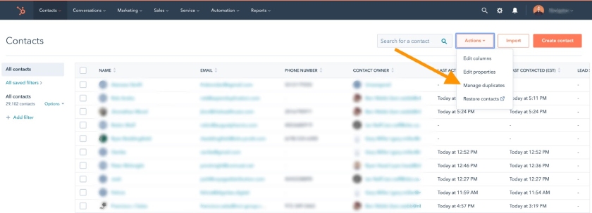 HubSpot CRM's contact dashboard where you can find the Actions and Manage Duplicates tabs.