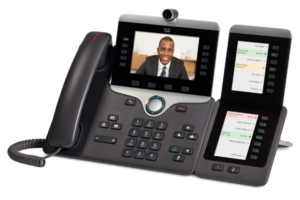 The Cisco 8865 with an active video conference call and the optional expansion module.