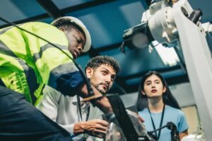 Robotic engineer and team oversee software, machine tool performance, enhance program for efficiency