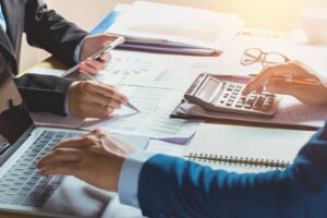 A group of accountants auditing their business finances.