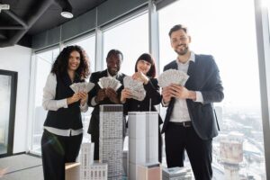 Group of Multi-ethnic people holding money