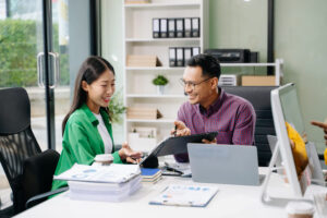 Business people working together in modern office.