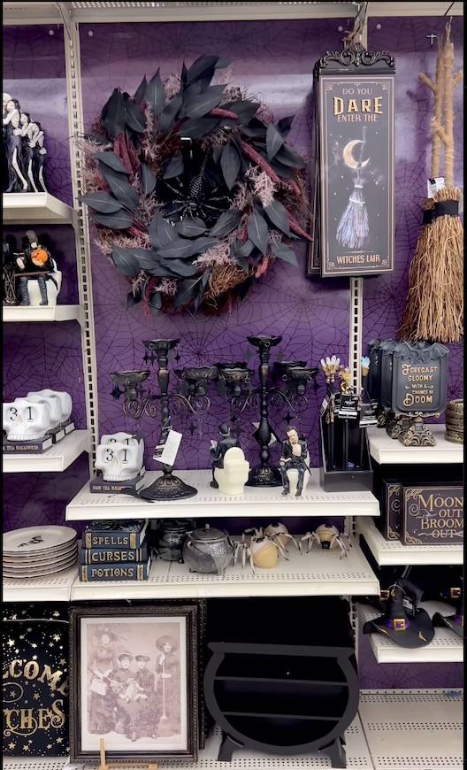 Halloween trend Michaels midnight moon collection shelf display.