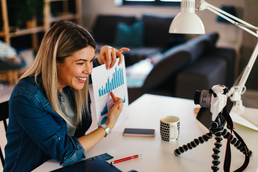 influencer holding a graph