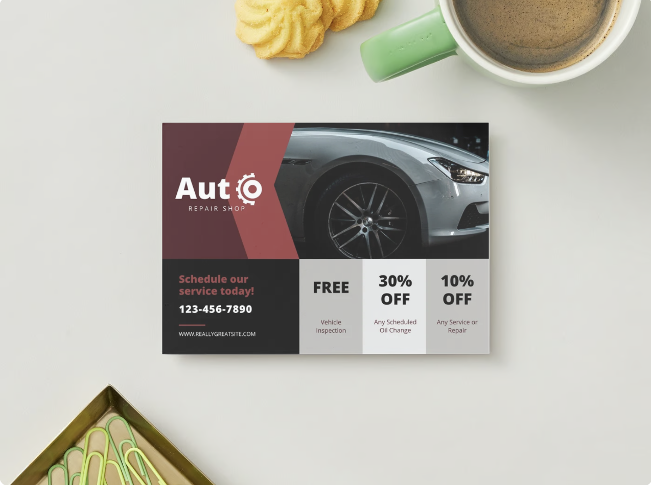 A sample postcard from a mechanic service with multiple discount coupons.