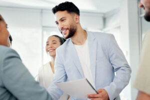 Business people man and woman with handshake for agreement contract