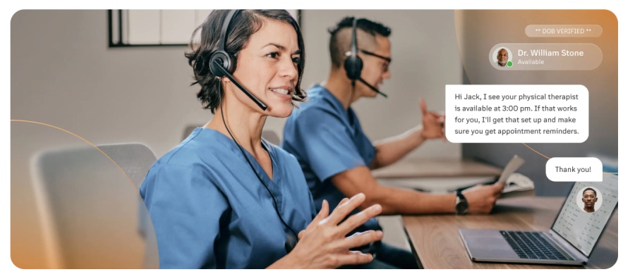 Receptionist in a medical office offering an appointment reminder to a patient over the phone.