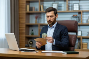 A focused mature businessman wearing a suit