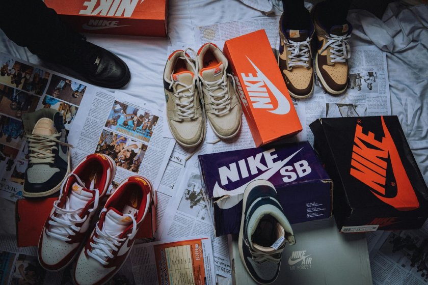 Nike sneakers various styles, with shoeboxes laid out.