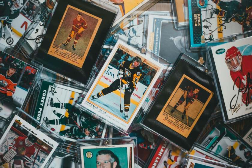 Trading cards hockey autographed and signed sports memorabilia with protective acrylic cases.