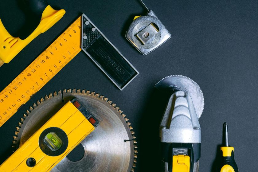 Yellow and Black Hand Tools on the Table.