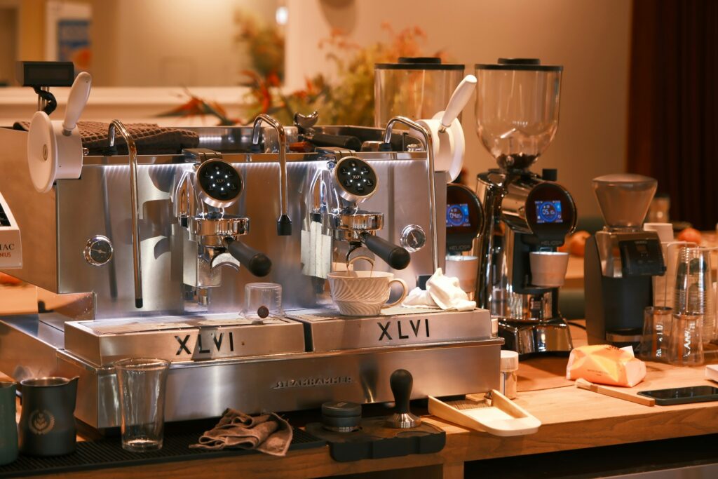 Coffee machine sitting on top of a wooden counter
