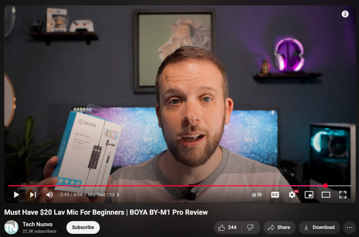 A tech vlogger doing a demo and review of a microphone on YouTube.