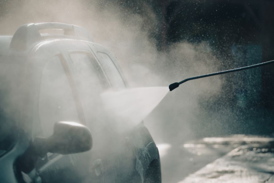 Car being pressure wash