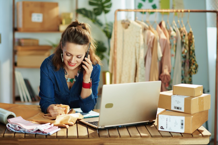 A business owner contacting customers.