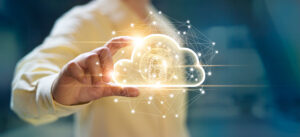 Man holding cloud computing data and security on global networking