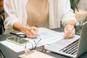 Woman working on an accounting report