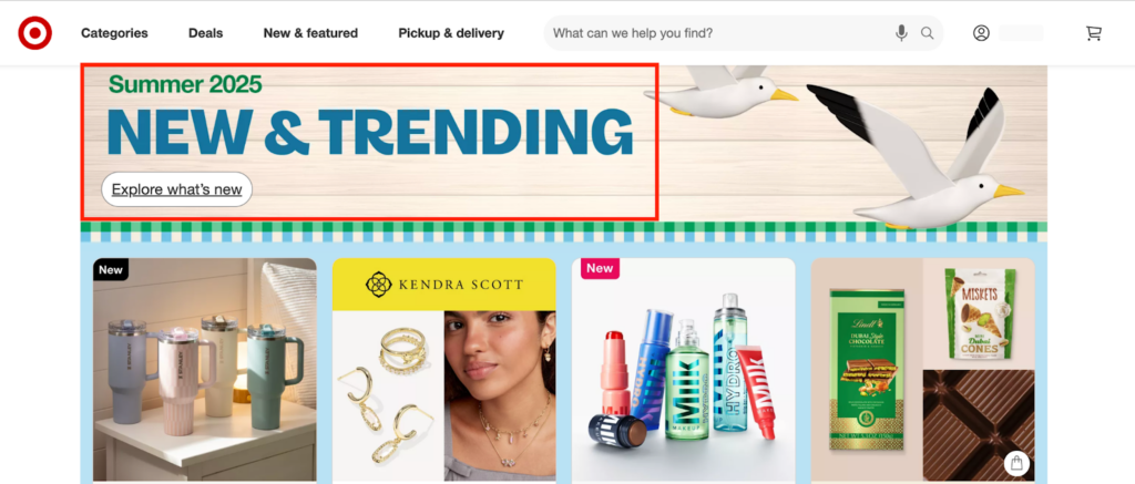 Ecommerce product recommendation example Target website homepage featuring a summer 2025 promotion banner that reads 'NEW & TRENDING' with an 'Explore what’s new' button. Decorative seagulls and a blue-green border frame the top. Below the banner are product tiles featuring Stanley tumblers, Kendra Scott jewelry, MILK makeup, Lindt chocolate, and Miskets snacks.