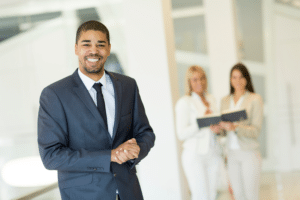 Young man and people working in the office