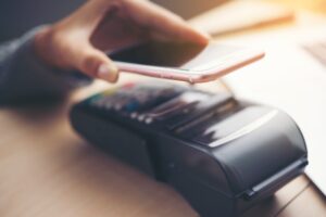 A customer paying through a smartphone.