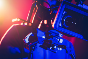 Camera Operator Behind Modern Digital Cinema Equipment