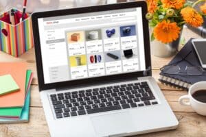 Online shop website design template on a laptop monitor
