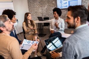 Group of business people having a meeting while sitting in circle.