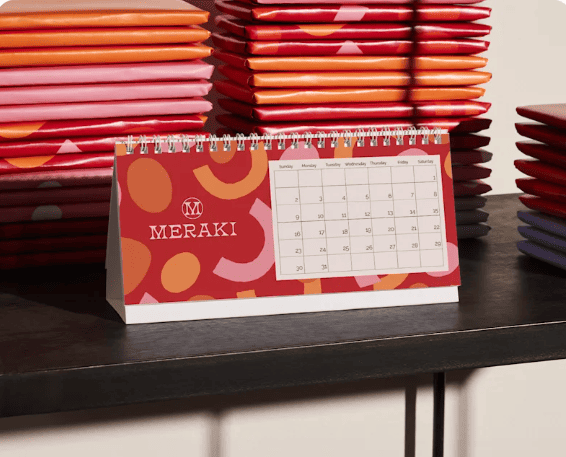 A corporate desk calendar designed and printed by VistaPrint.